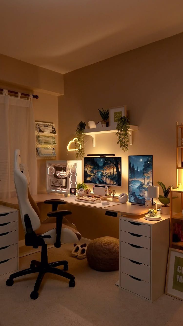 Gaming nook with white desk, dual monitors, warm lighting, and indoor plants.