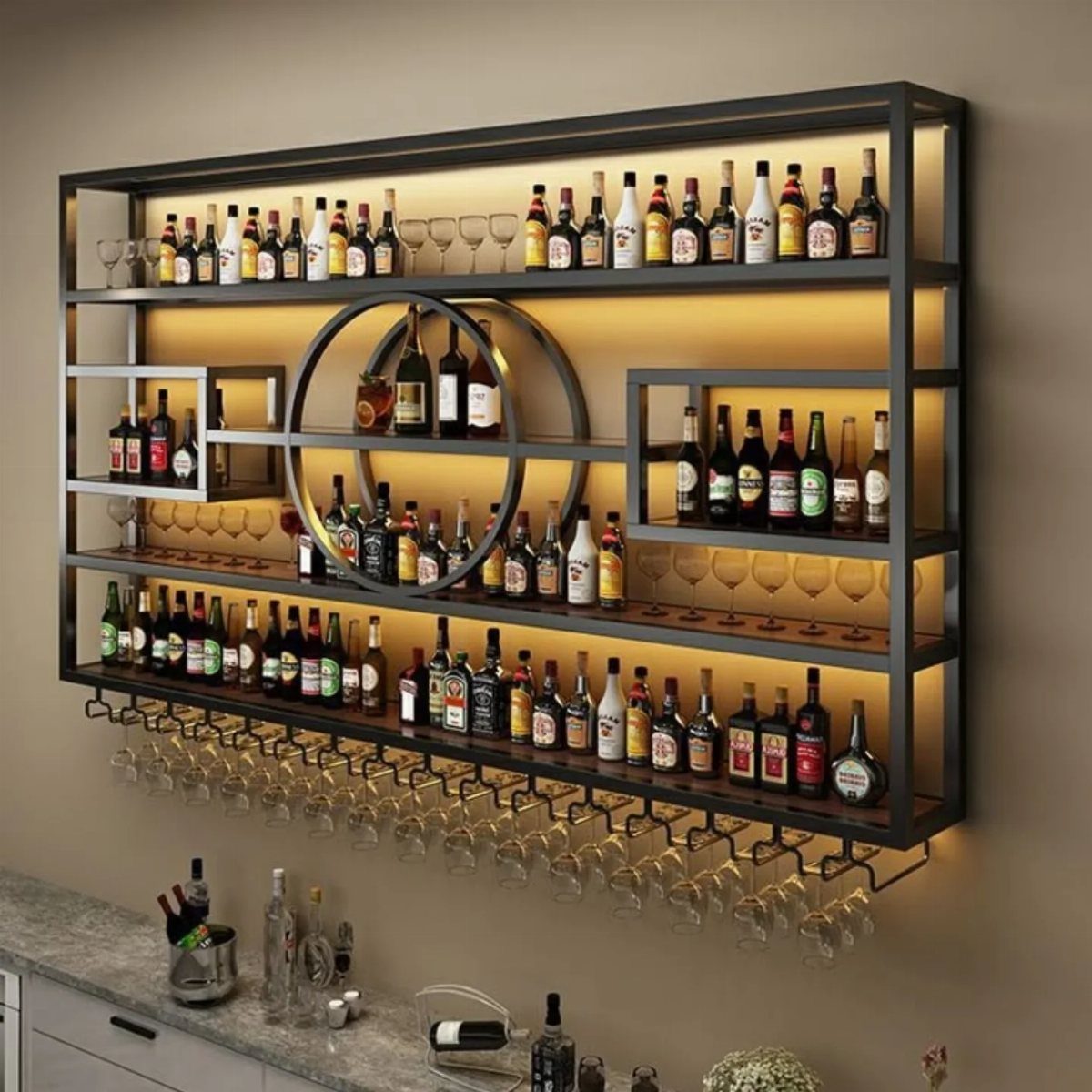 Wall-mounted black metal bar shelf with liquor bottles and hanging wine glasses.