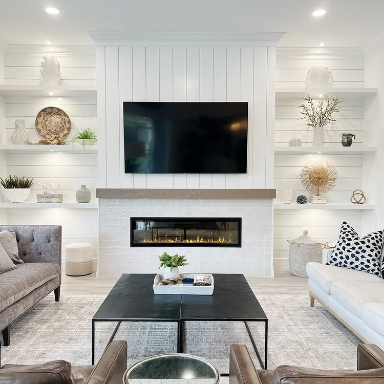 White shiplap accent wall with a linear fireplace and television in a modern living room