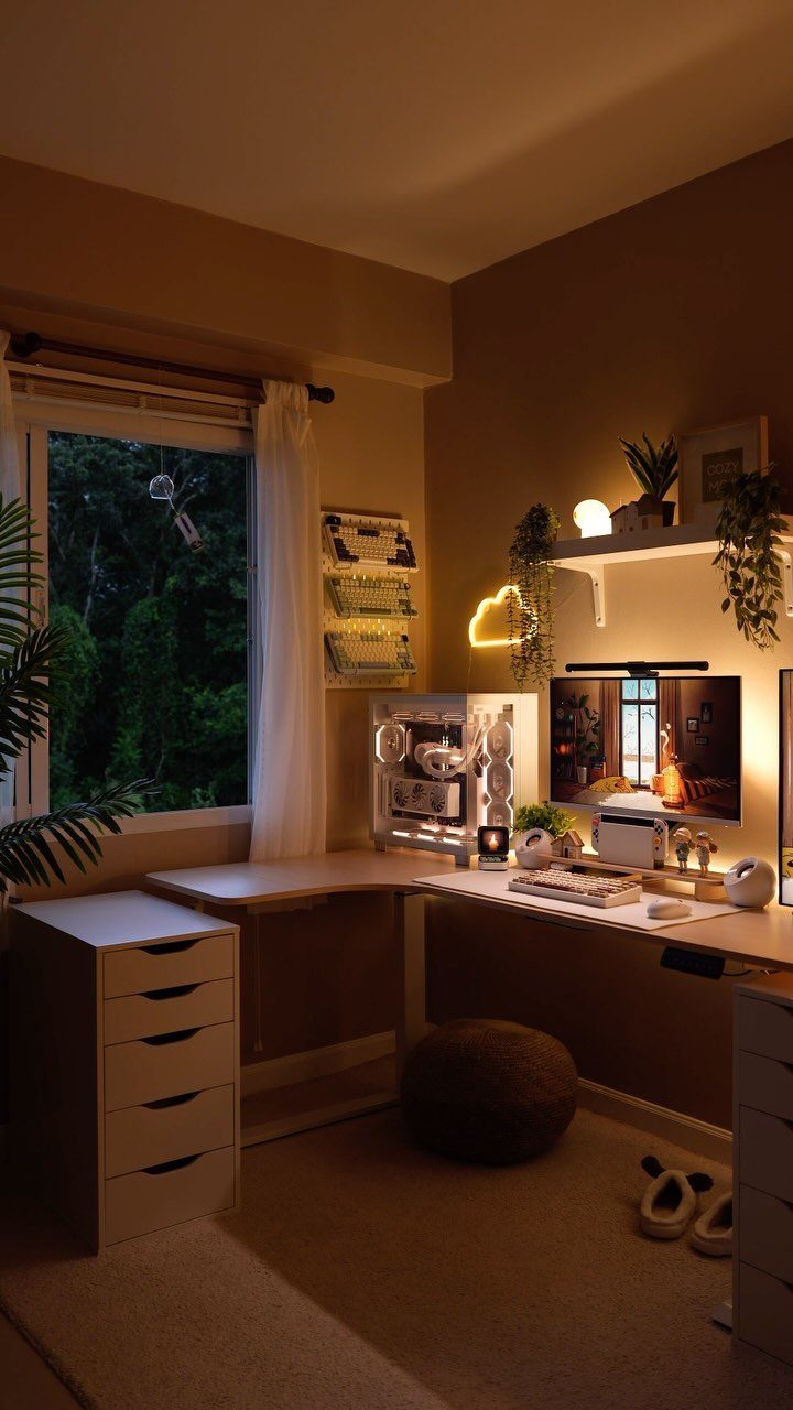 Cozy home office with warm ambient lighting from neon and desk lamps.