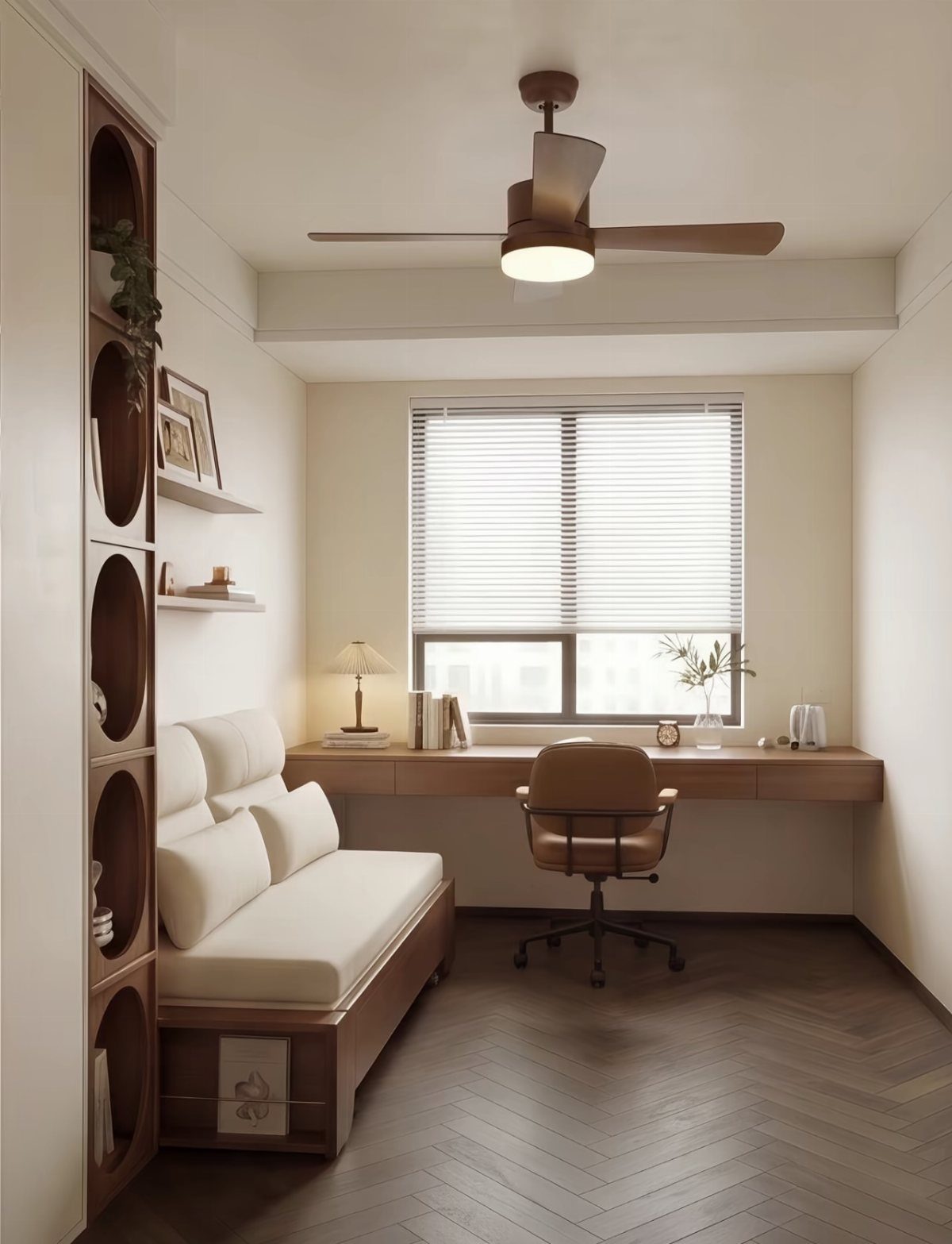 Home office with a built-in wooden desk, leather chair, and white sofa.