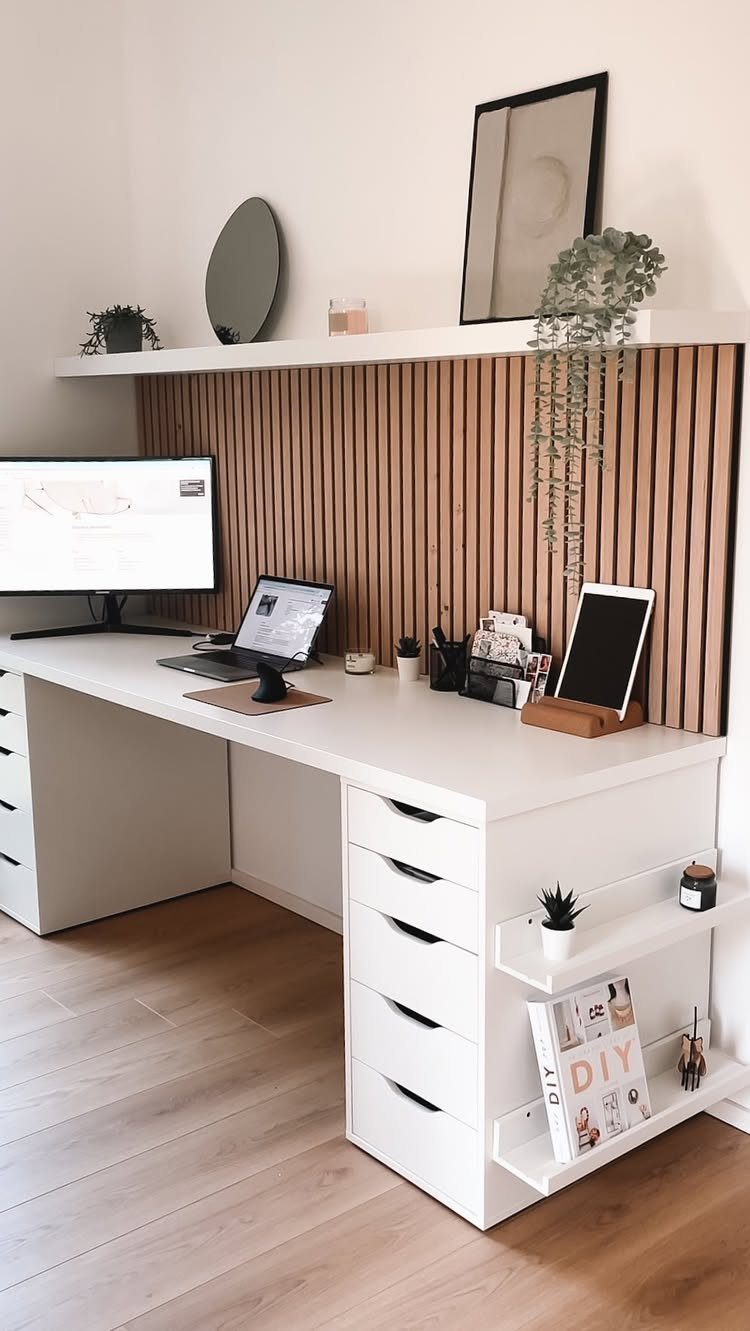 White IKEA Alex desk hack with wooden slat wall and overhead shelf.