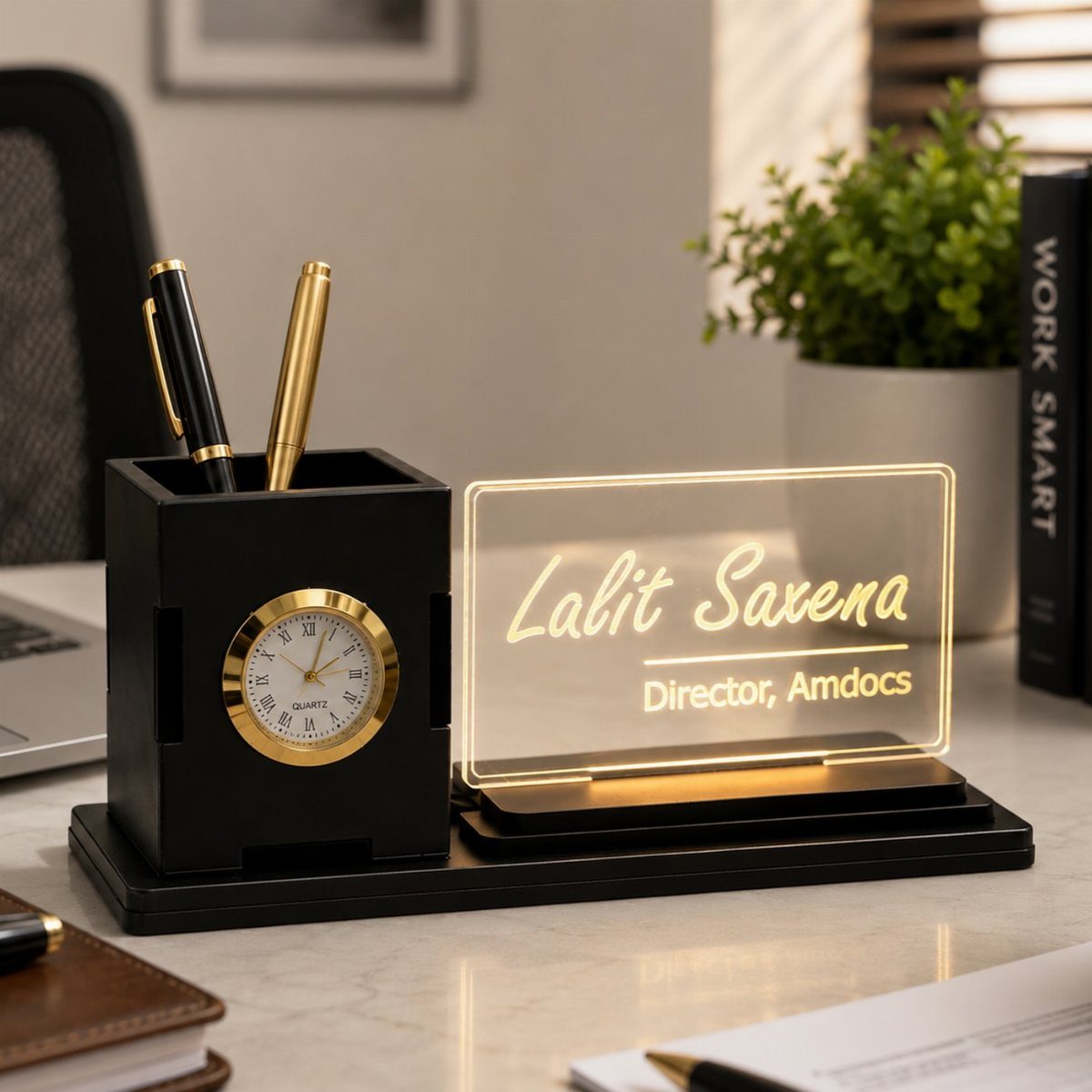 Personalized desk organizer with a glowing nameplate, gold pens, and a small clock.