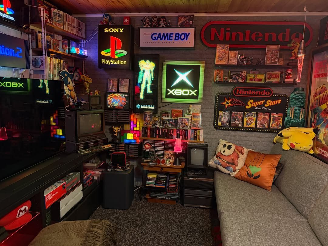 Retro gaming room with neon signs, CRT TVs, and shelves of vintage games.