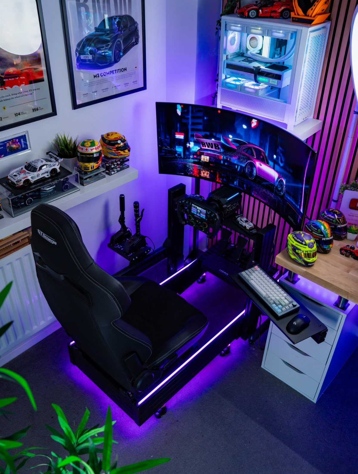 Racing simulator setup with bucket seat, curved monitor, and purple ambient LED lighting.