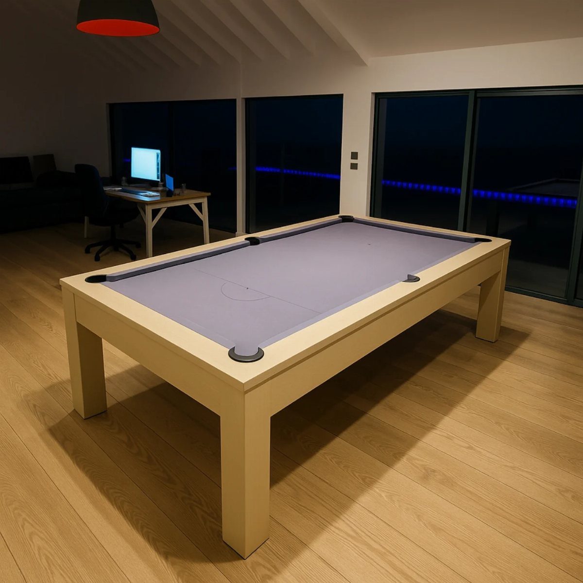 Light wood pool table with grey felt in a modern minimalist room