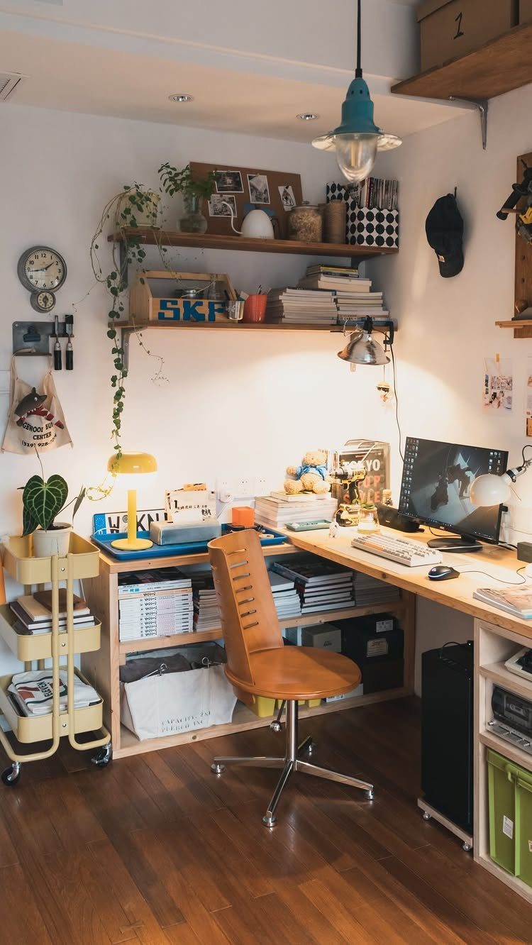 Light wooden plywood desk with integrated shelving and matching chair in home office.