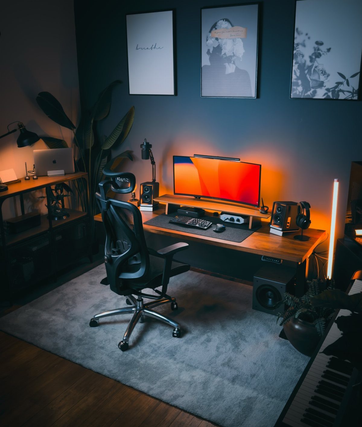 Modern home office setup with a wooden desk and grey rug on floor