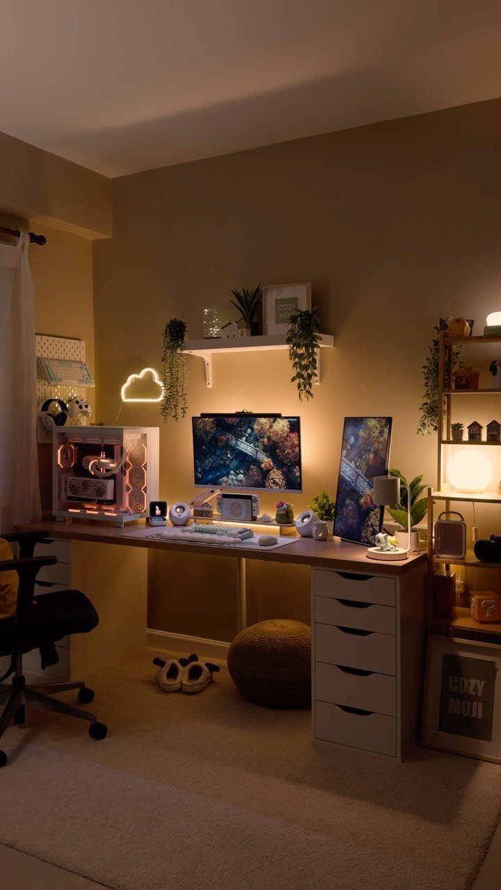 Gaming desk setup with warm golden ambient lighting, a PC, and cloud neon light.
