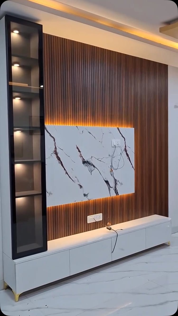 Wooden slat wall with marble center panel and white floating media console